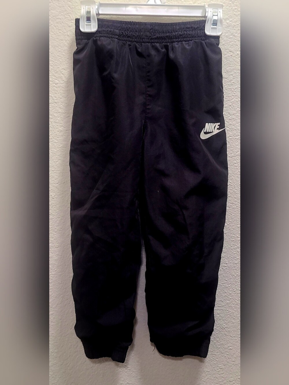 Nike Black Youth Jogger Pants with White Swoosh
